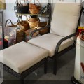 L01. All-weather wicker chair and ottoman. 